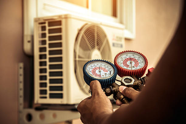 Professional Heat Pump Repair technician working in Lima, OH